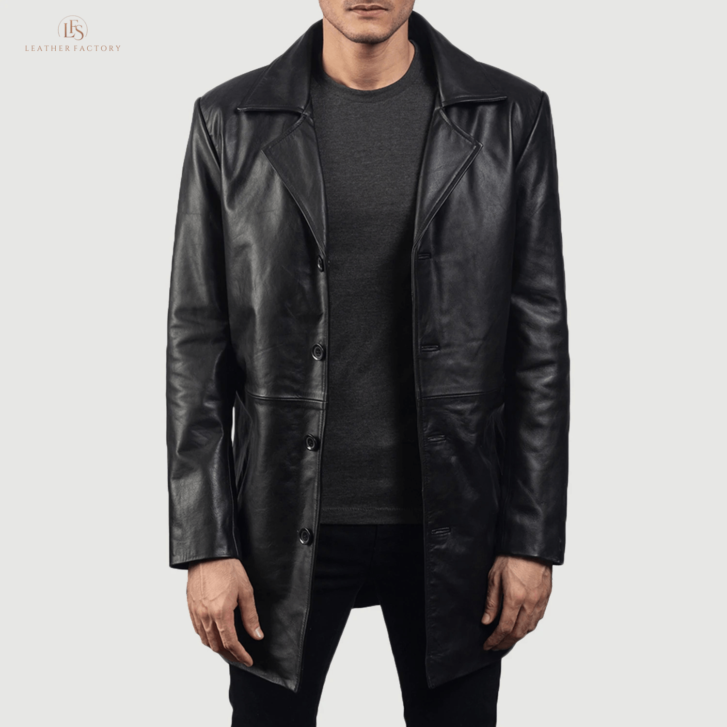 Man wearing a premium black genuine cowhide leather long coat with a sharp notch lapel and button front closure