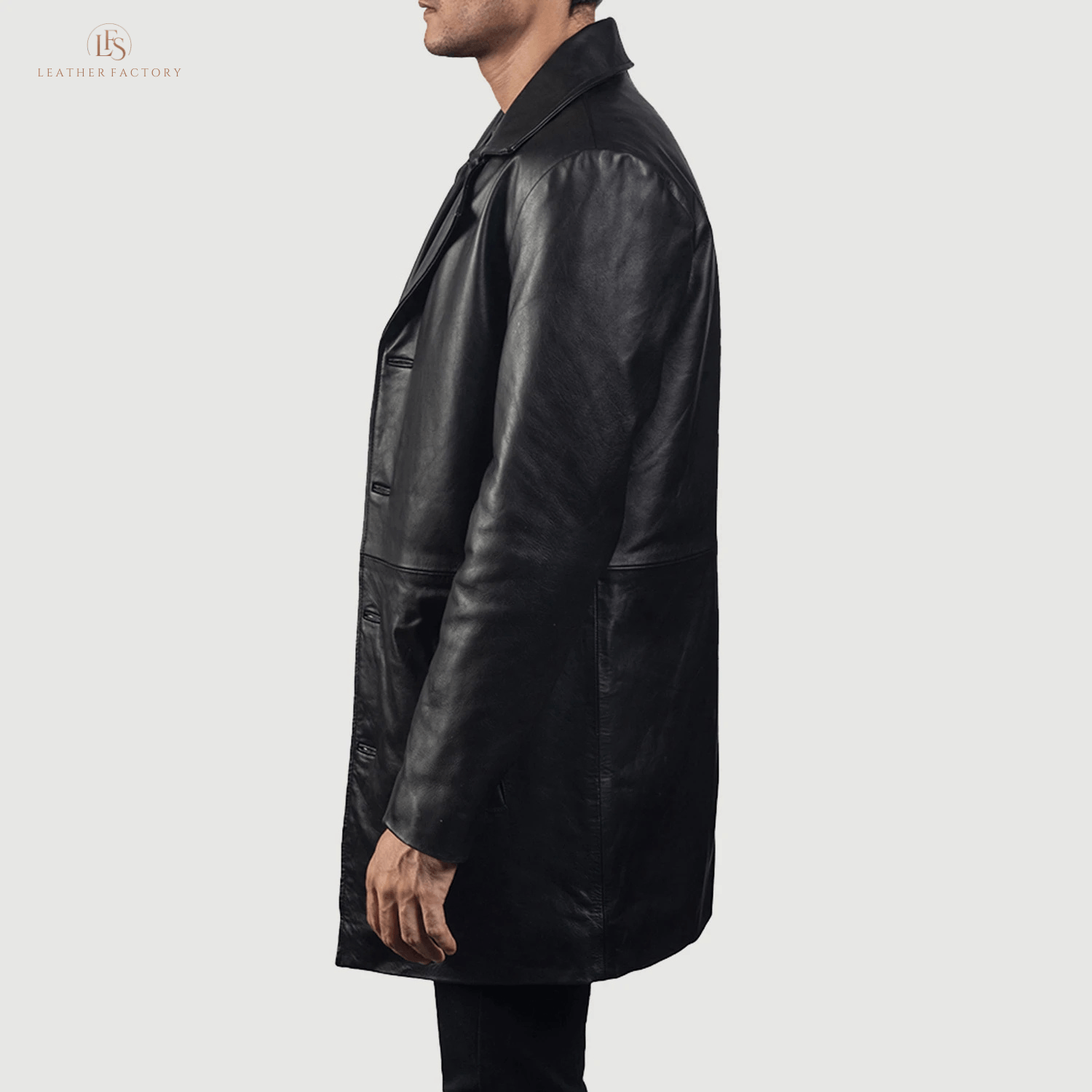 Man wearing a premium black genuine cowhide leather long coat with a sharp notch lapel and button front closure