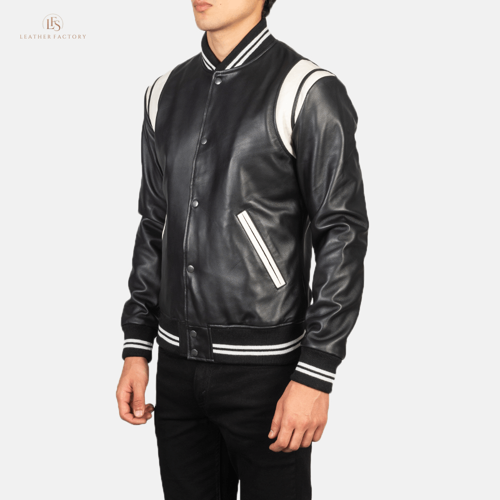 The Stadium Elite black and white leather varsity jacket with striped rib knit collar and cuffs