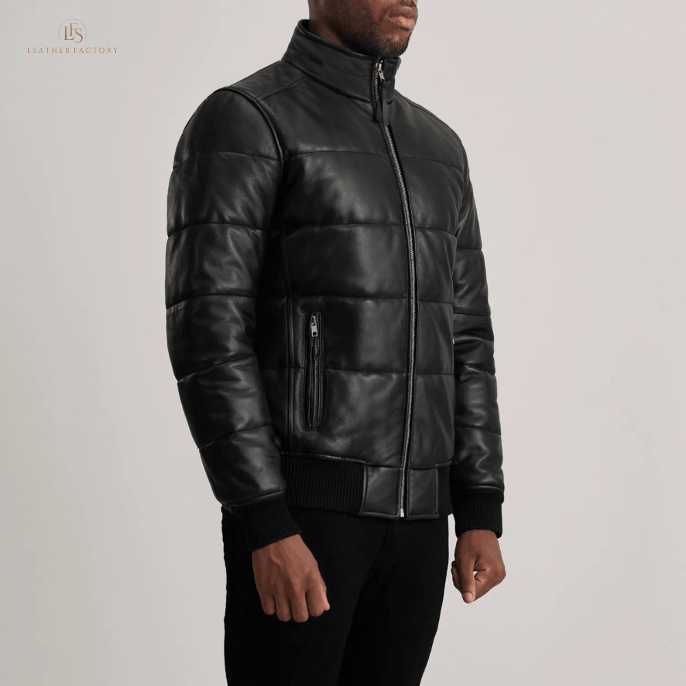 Man wearing a premium black sheepskin leather puffer bomber jacket with high neck and rib knit cuffs