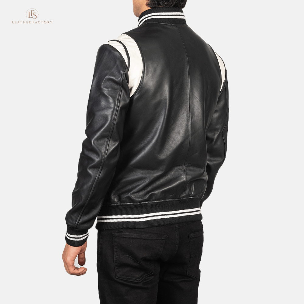The Stadium Elite black and white leather varsity jacket with striped rib knit collar and cuffs