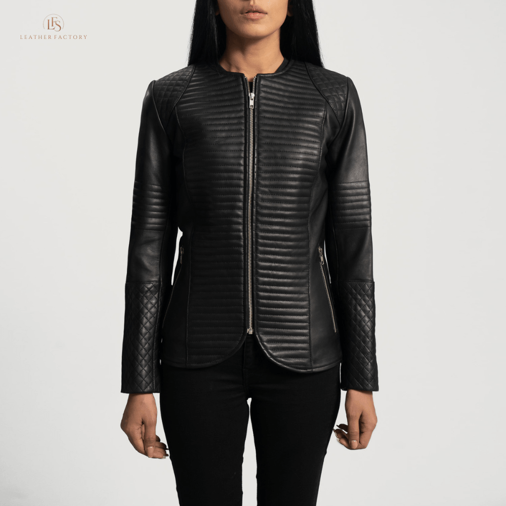 Woman wearing a premium black cowhide leather biker jacket with notch collar, zippered cuffs, removable belt, shoulder epaulettes, and multiple pockets