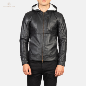 Man wearing a premium black sheepskin leather bomber jacket with integrated hood and snap button cuffs