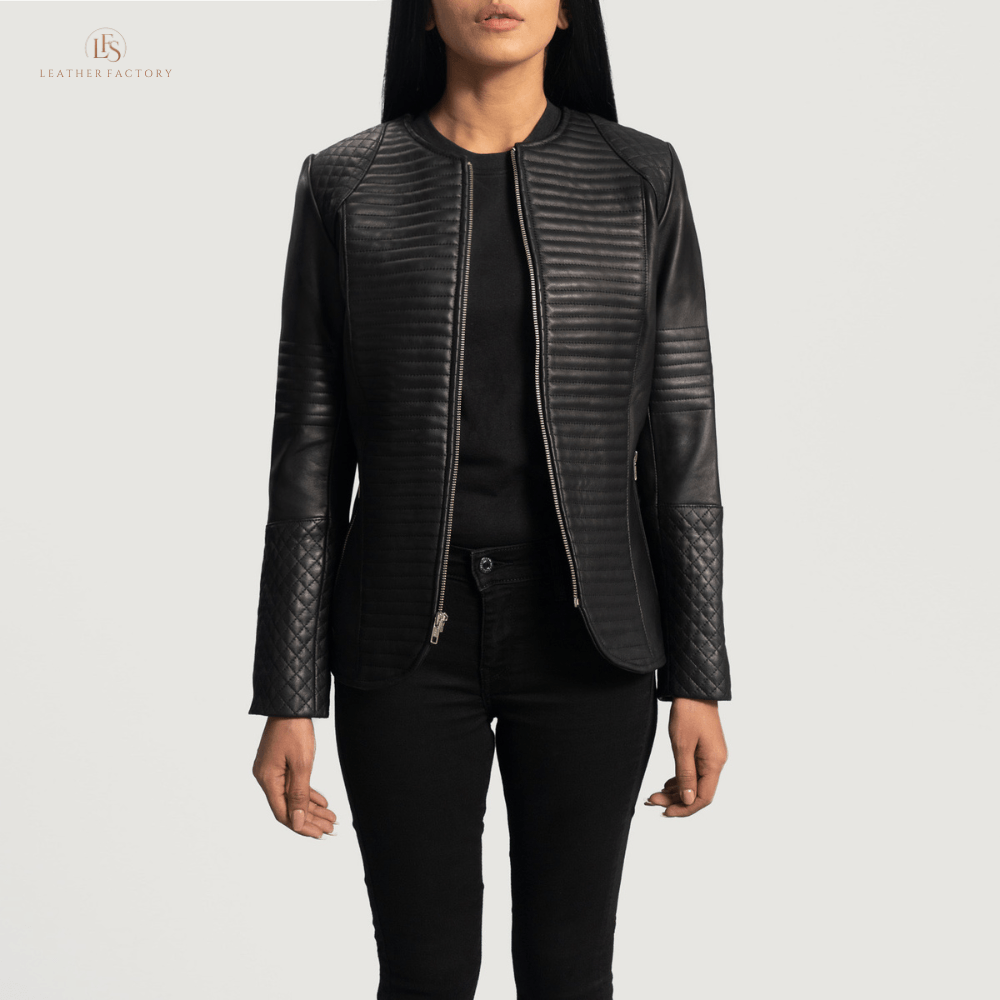 Woman wearing a premium black cowhide leather biker jacket with notch collar, zippered cuffs, removable belt, shoulder epaulettes, and multiple pockets