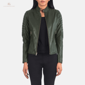 Woman wearing The Sovereign green sheepskin leather biker jacket featuring quilted detailing, a soft band collar, and zippered cuffs.