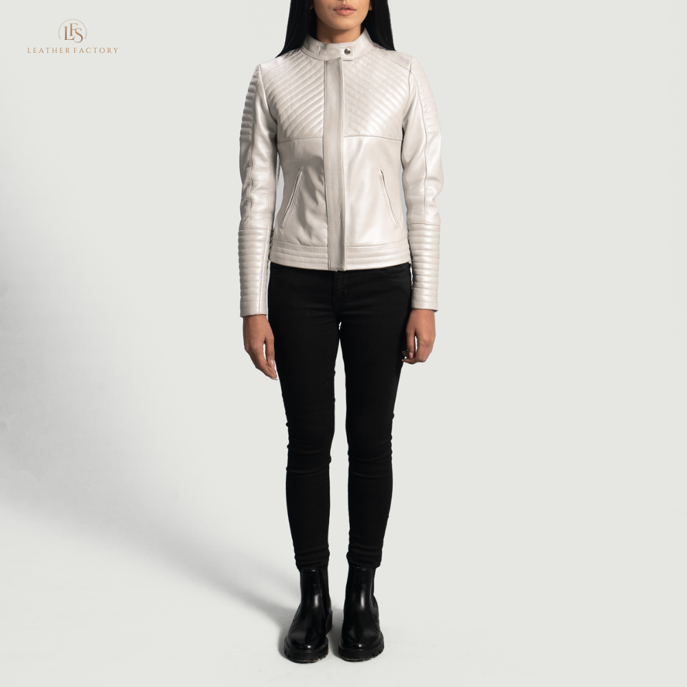 Woman wearing The Silver Quilted off-white sheepskin leather moto jacket featuring a band collar with snap button and zippered cuffs.