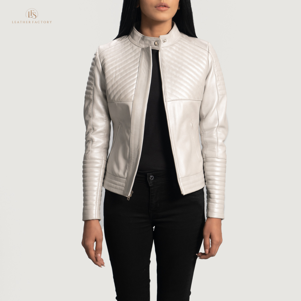 Woman wearing The Silver Quilted off-white sheepskin leather moto jacket featuring a band collar with snap button and zippered cuffs.