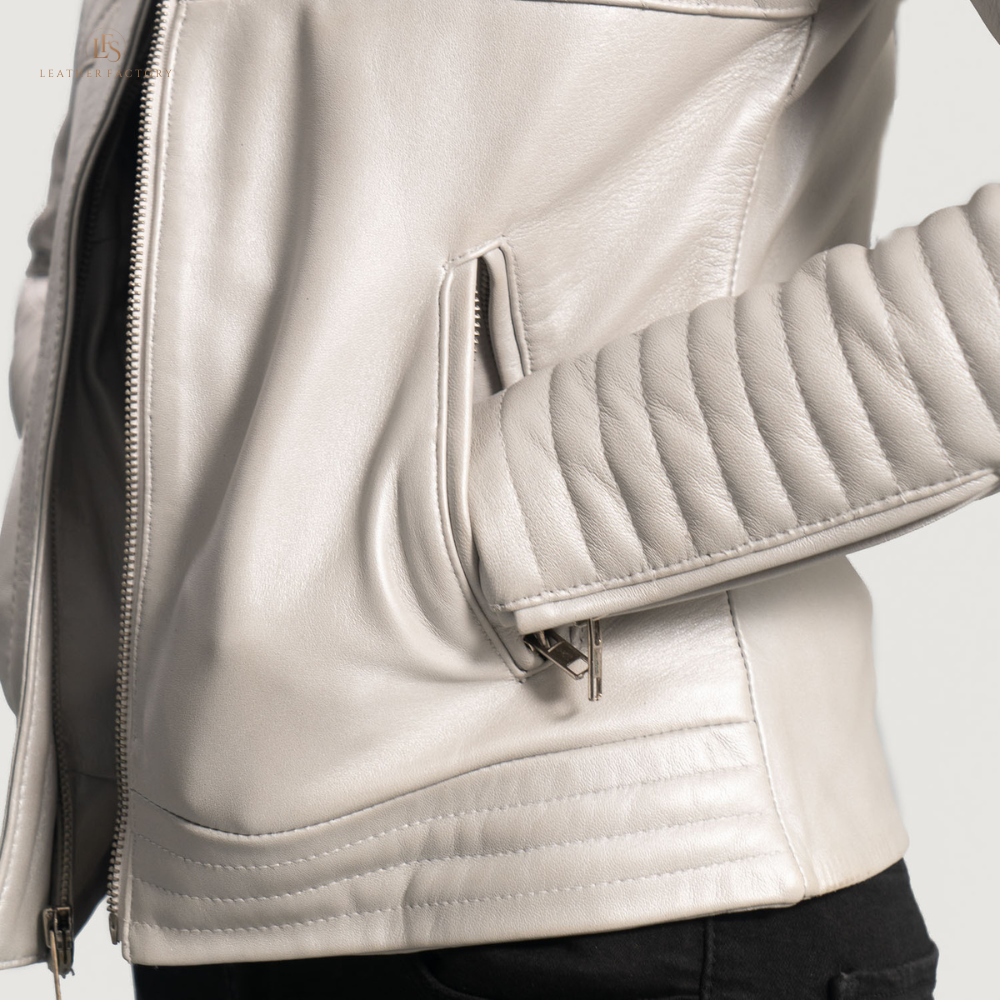 Woman wearing The Silver Quilted off-white sheepskin leather moto jacket featuring a band collar with snap button and zippered cuffs.