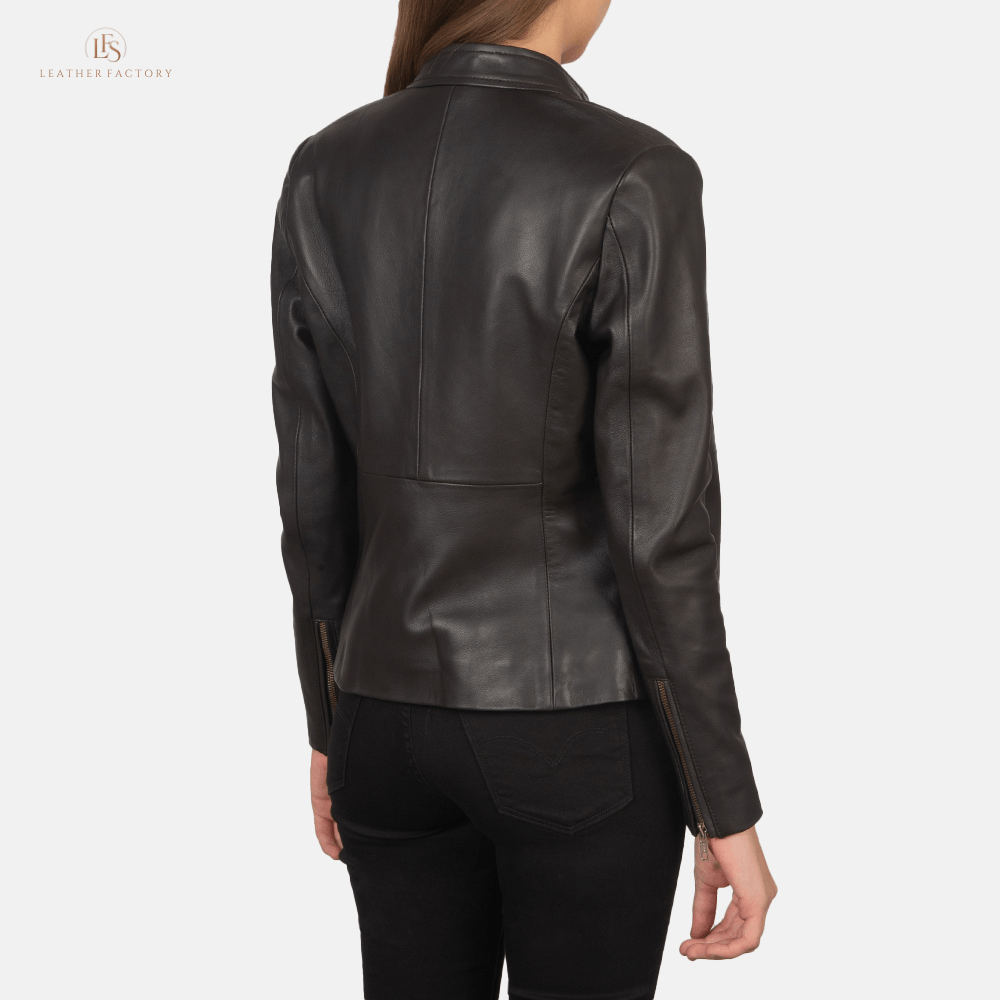 Woman wearing The Valor rich brown sheepskin leather biker jacket featuring a snap-button band collar and zippered cuffs.